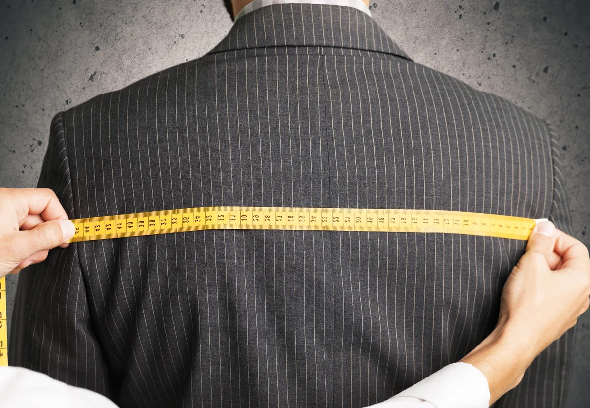Measuring the back of a suit jacket for alterations